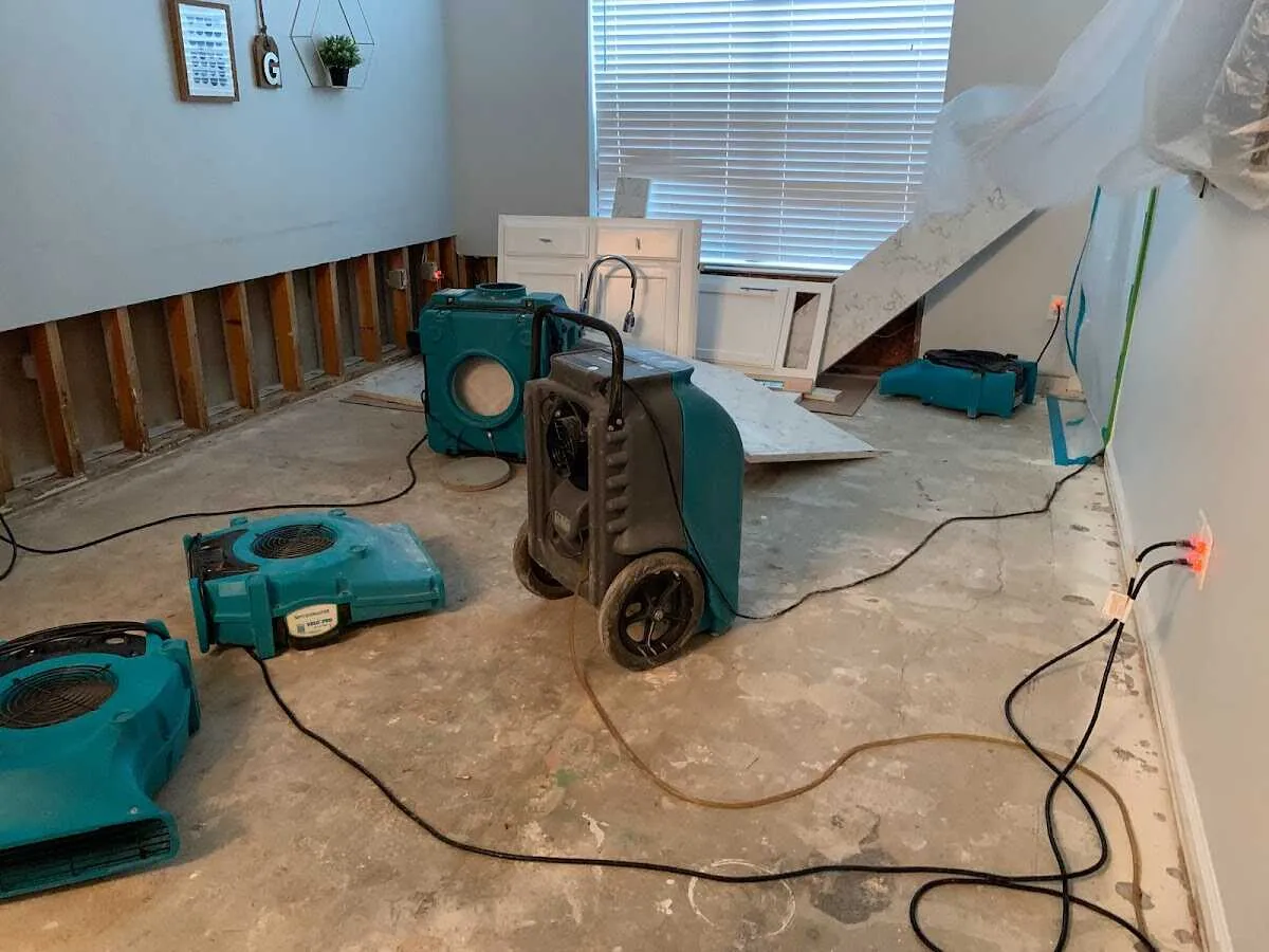 Dehumidifier in flood-cut room for Water Damage Restoration in Round Lake Beach